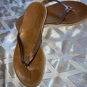 Olukai rose gold leather flip flops
